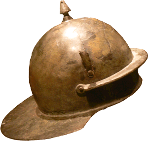 Coolus vom Typ Hagenau. An einigen Hagenau/Coolus-Helmen sind über den Befestigungsnieten des Stirnschutzes Metalltüllen angebracht, in die wohl Federn gesteckt wurden. Ein weiteres Merkmal für viele Hagenau/Coolus-Helme ist ein Helmbuschhalter der Helmglocke, der ganz leicht an die Spitze einer Pickelhaube erinnert.
