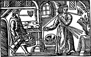 Mann und Frau, die Kienspäne mit dem Mund halten, weil sie die Hände zum Arbeiten brauchen (16. Jahrhundert)